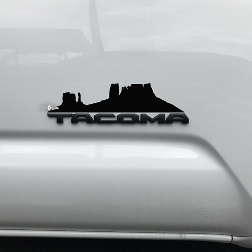 Toyota Tacoma Mountains Arizona Canyon Decal Sticker Over Badge
 1